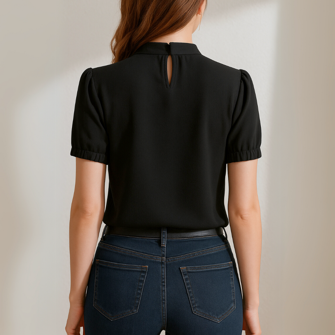 Blusa Prisca negra con mangas con abertura y plisadas