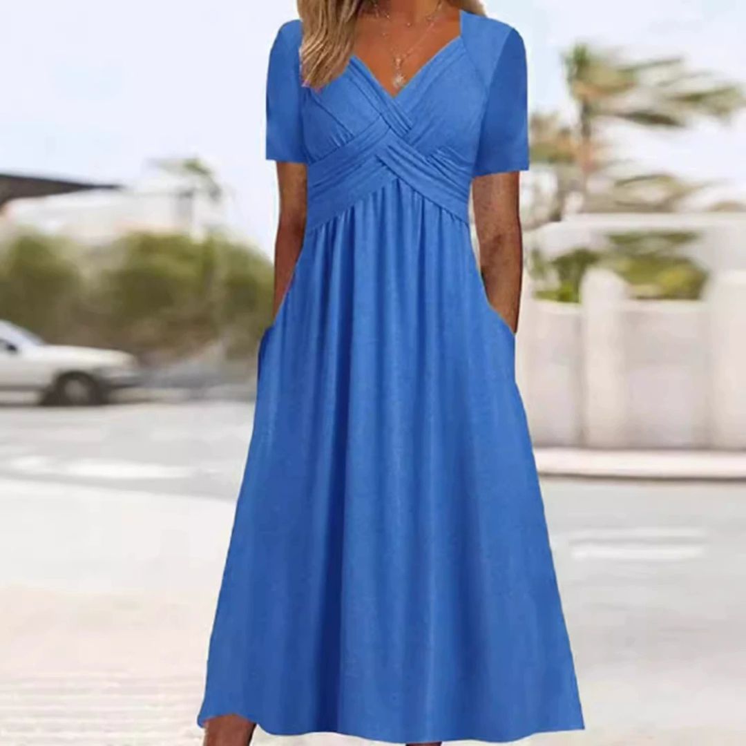 Bożena - Un vestido elegante que estiliza la figura.