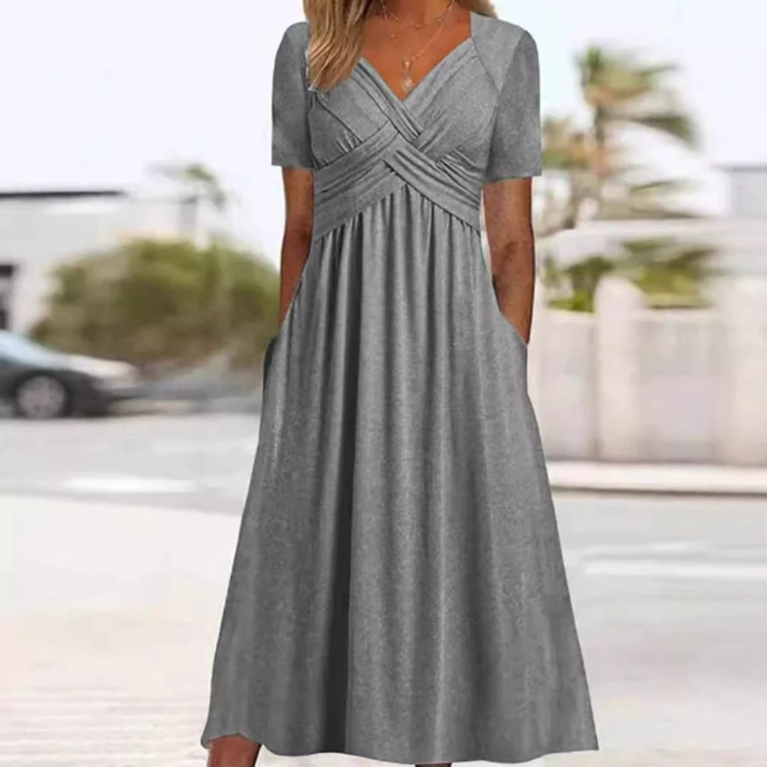 Bożena - Un vestido elegante que estiliza la figura.