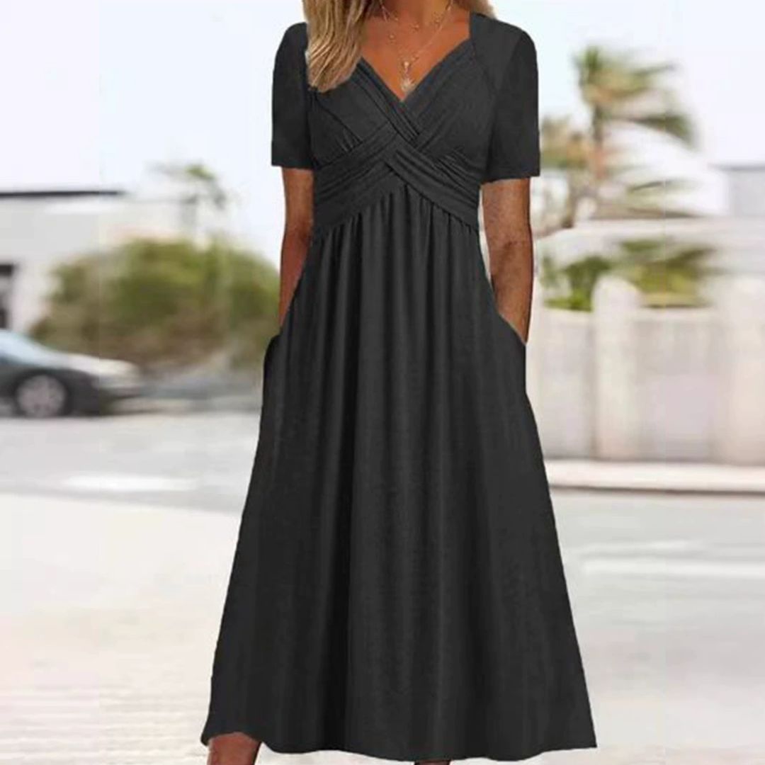 Bożena - Un vestido elegante que estiliza la figura.