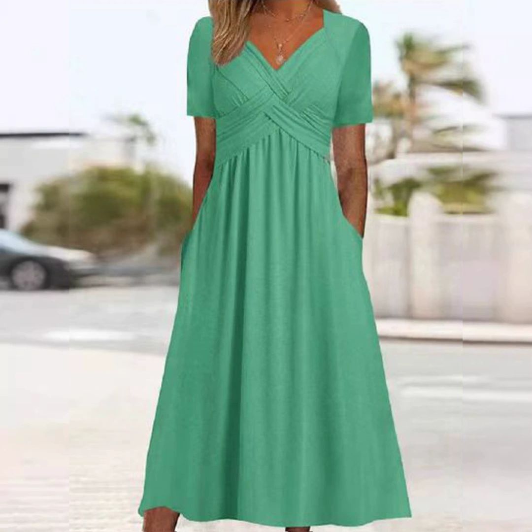 Bożena - Un vestido elegante que estiliza la figura.