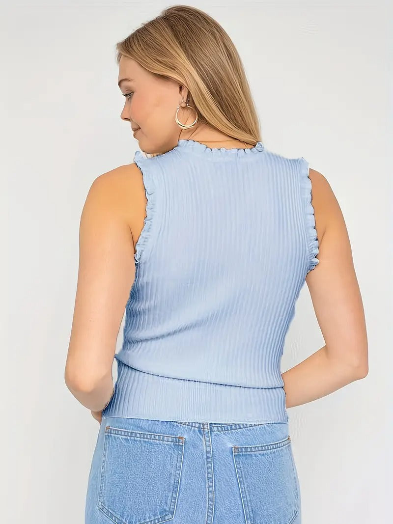Evania – Elegante top con volantes y brillo