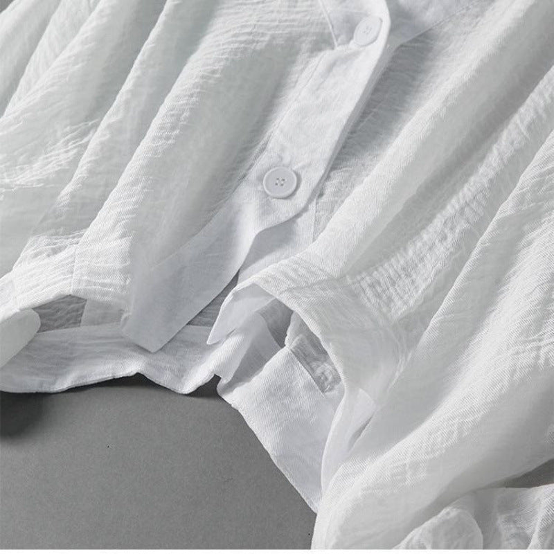Aviela – Blusa vaporosa de lino con mangas murciélago
