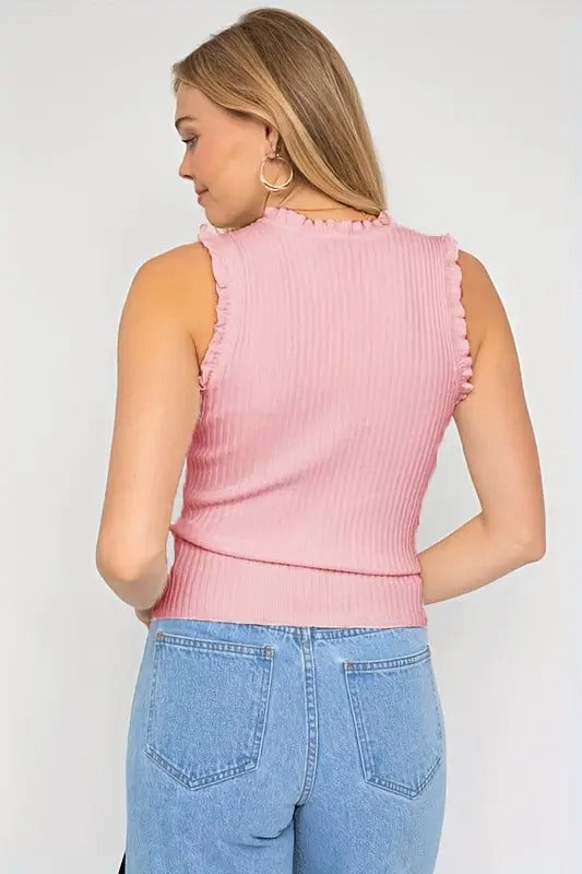 Evania – Elegante top con volantes y brillo