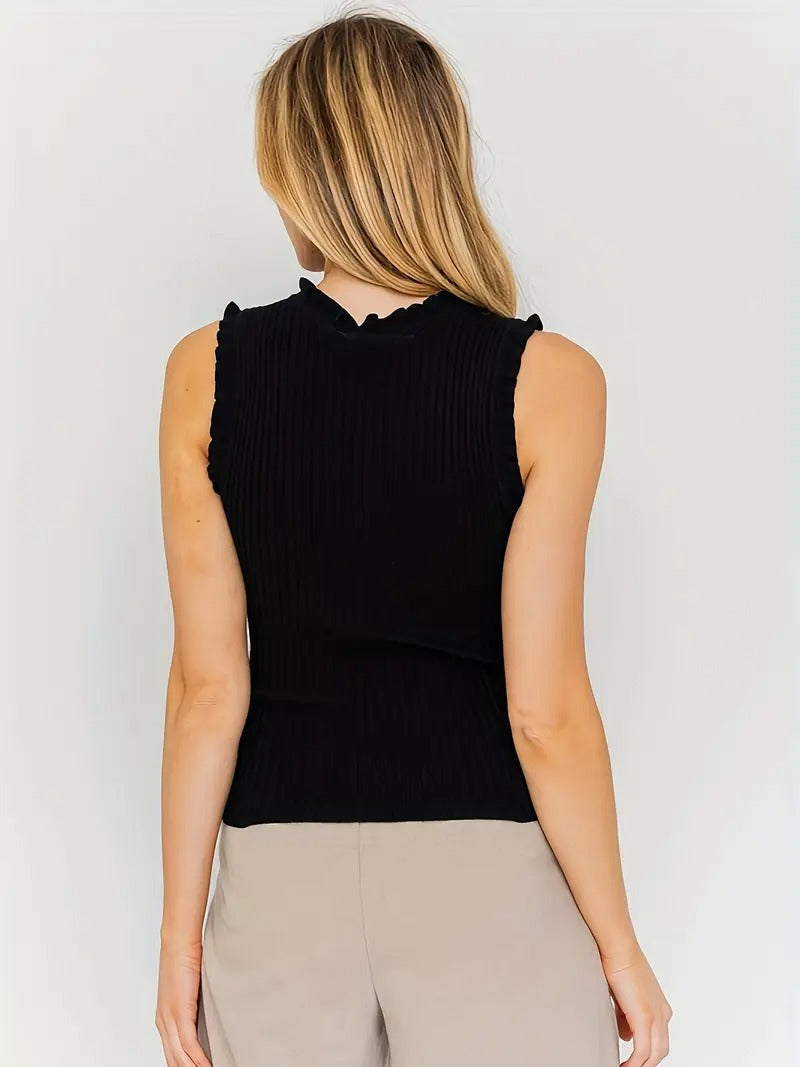 Evania – Elegante top con volantes y brillo